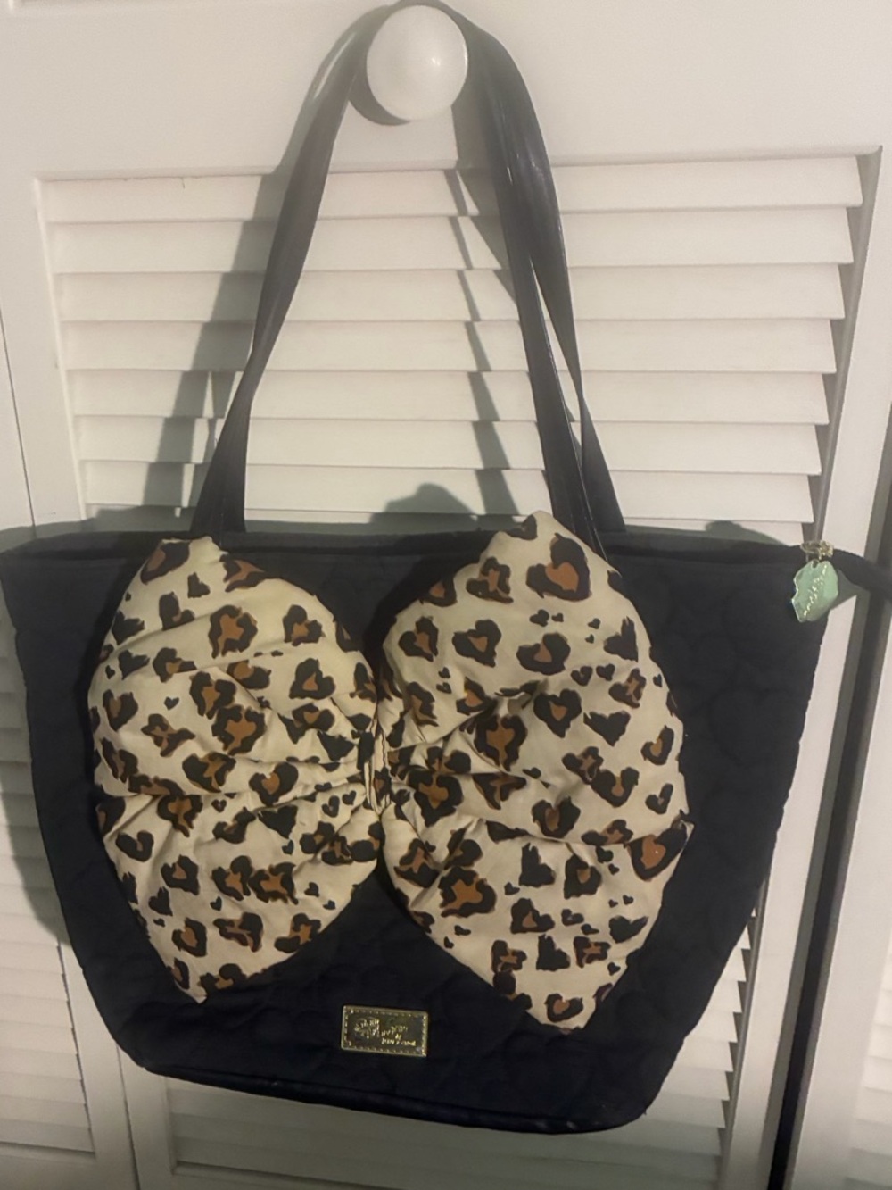 Betsy Johnston, black quilted purse with bow